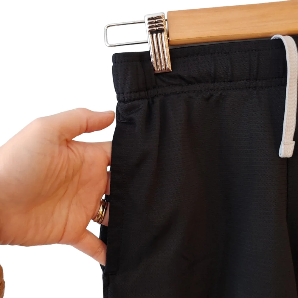 Nike Black Shorts with White Swoosh Size Small